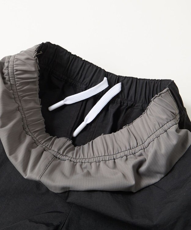 OP／FILA 【SEVEN2】異素材切替ナイロンパンツ ブラック