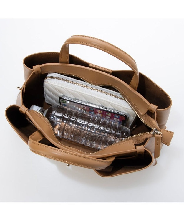 UNBILLION カカトゥ kakatoo / ヒネリ金具横長2wayショルダー ブラウン