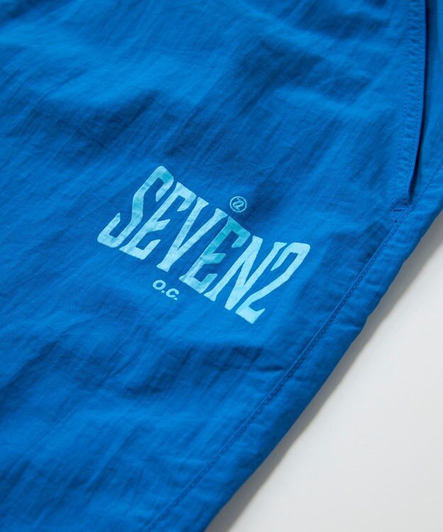 OP／FILA 【SEVEN2】異素材切替ナイロンパンツ ブルー