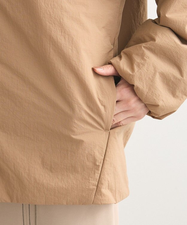 Green Parks シームレスライト中わたノーカラーブルゾン Camel