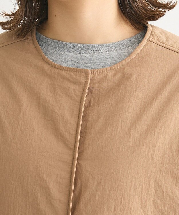 Green Parks シームレスライト中わたノーカラーブルゾン Camel