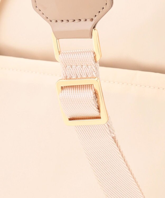 LA BAGAGERIE ツイルナイロン×エナメル リュックサック アイボリー