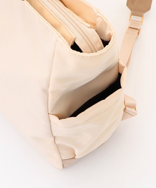 LA BAGAGERIE ツイルナイロン×エナメル リュックサック アイボリー