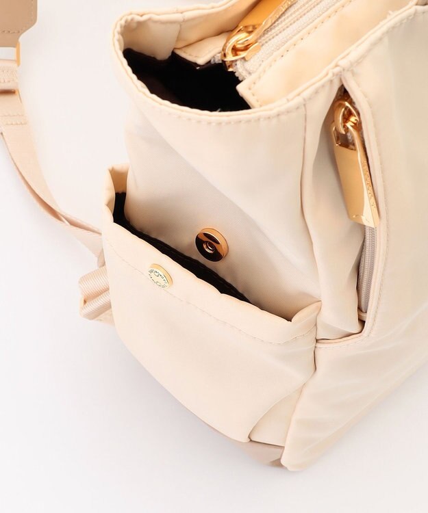 LA BAGAGERIE ツイルナイロン×エナメル リュックサック アイボリー