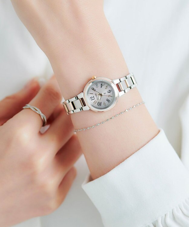 CITIZEN 【xC】エコ・ドライブ電波時計 ES9434-53X ワールドタイム  数字のインデックス サクラ色