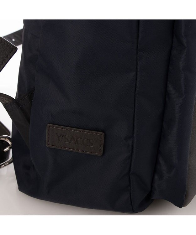 Y'SACCS リサイクルナイロン×カウレザー ラップリュック ネイビー