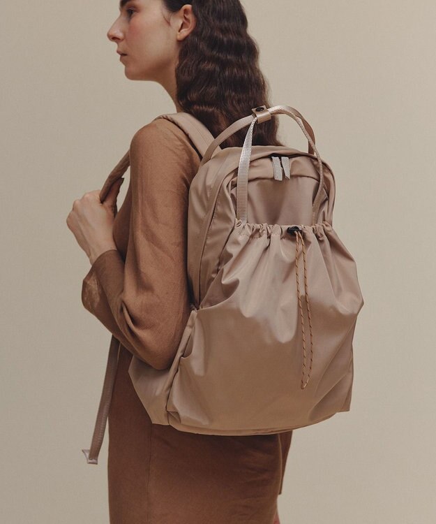 TOPKAPI 【TREASURE TOPKAPI】ドローストリング リュック / バッグパック ベージュ