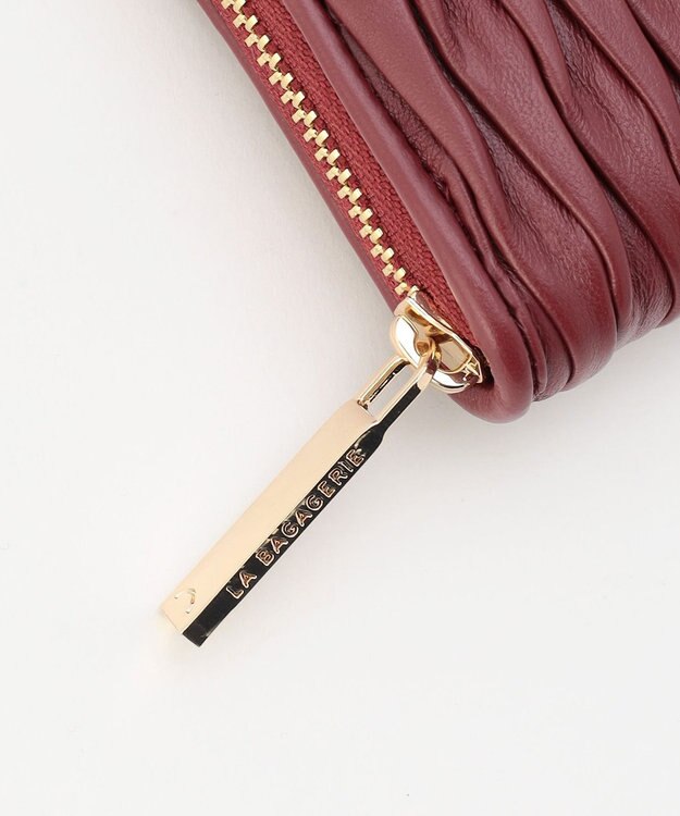 LA BAGAGERIE シープレザープリーツ加工ラウンドウォレット ワイン