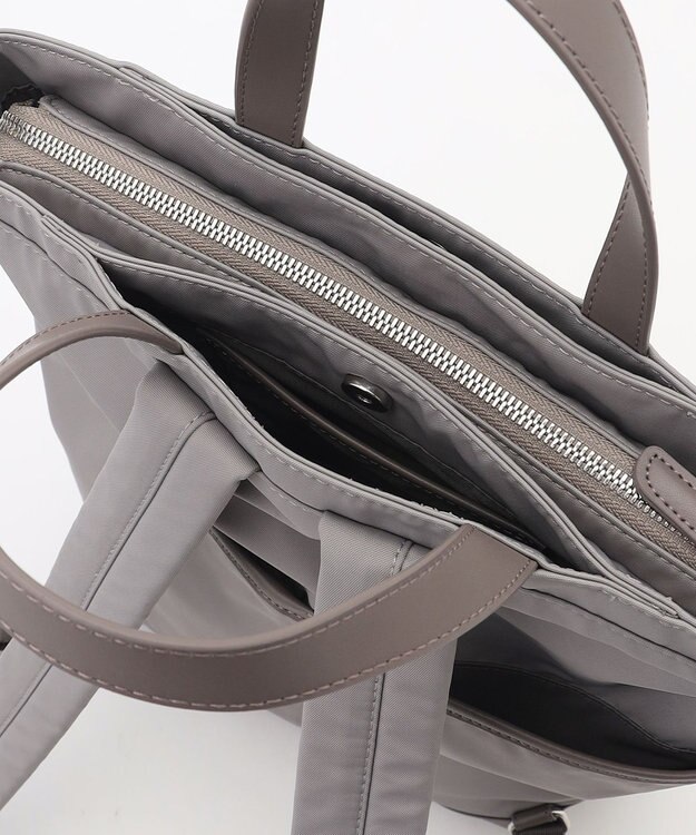 Y'SACCS アシメファスナーポケットリュック グレージュ