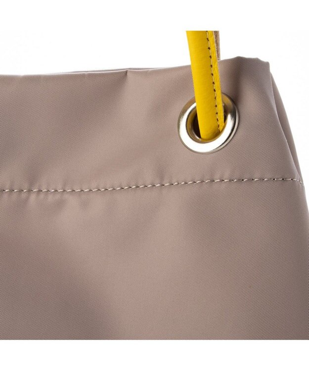 UNBILLION カシュカシュ cachecache / ナイロンツイル牛革付属ハトメショルダー イエロー