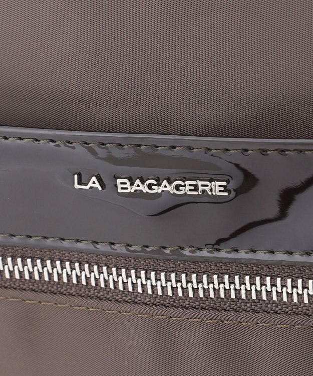 LA BAGAGERIE エナメルアクセントリュックサック グレー
