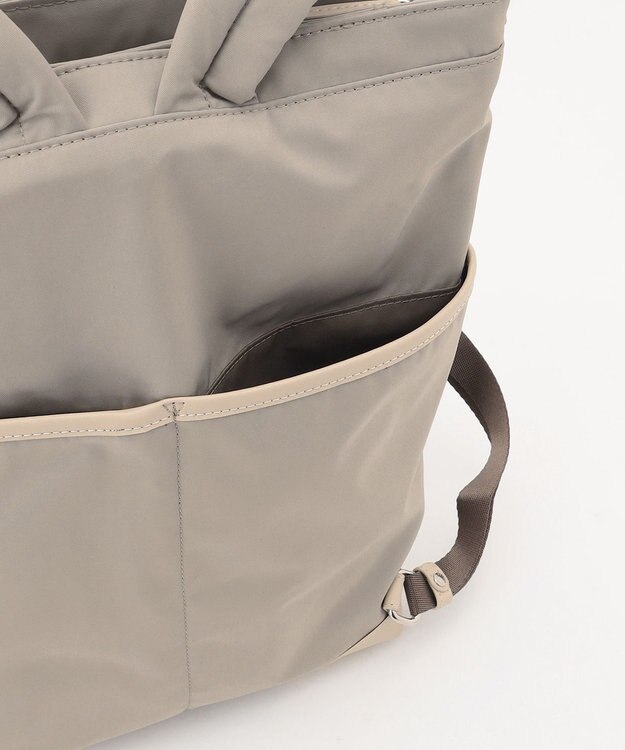 Y'SACCS アシメファスナーポケットリュック ベージュ