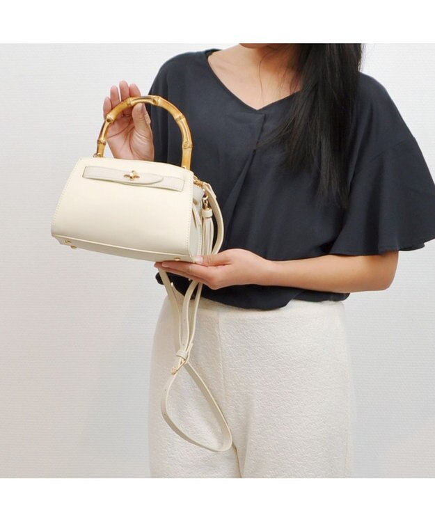 UNBILLION カシュカシュ cachecache / バンブーヒネリミニハンドバッグ アイボリー