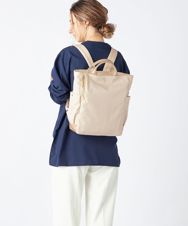 LA BAGAGERIE ツイルナイロン×エナメル リュックサック アイボリー
