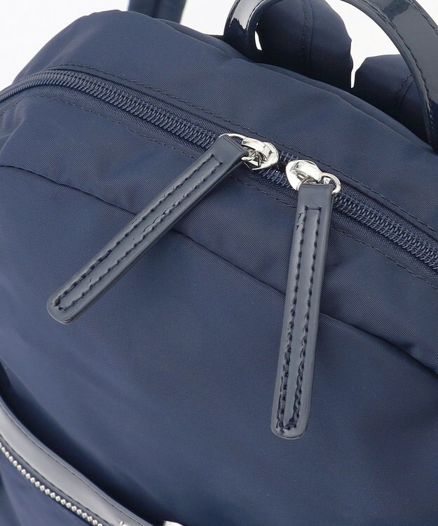 LA BAGAGERIE エナメルアクセントリュックサック ネイビー