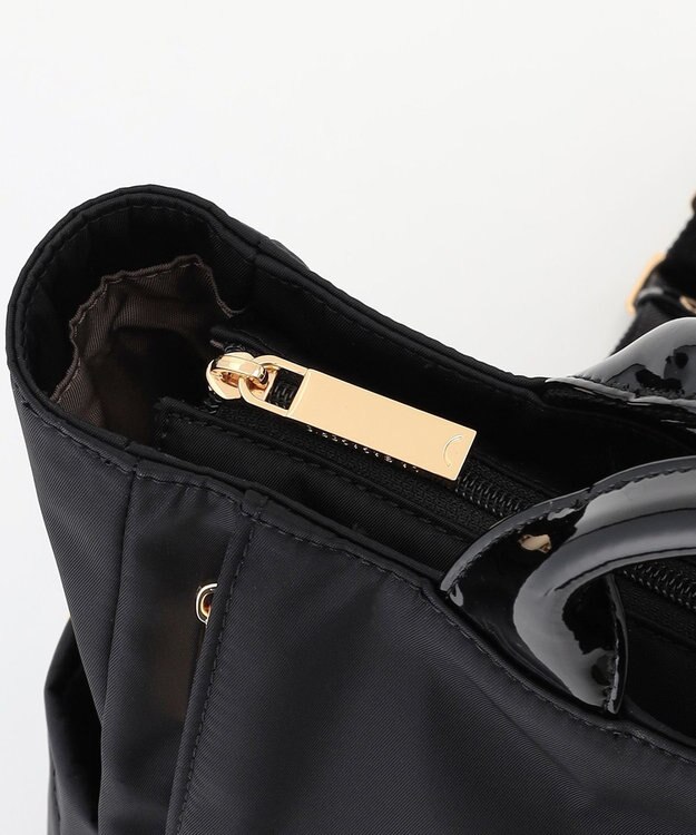 LA BAGAGERIE ツイルナイロン×エナメル リュックサック ブラック