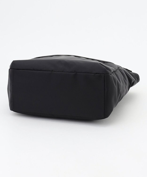 LA BAGAGERIE チャーム付き　ナイロンリュック ブラック