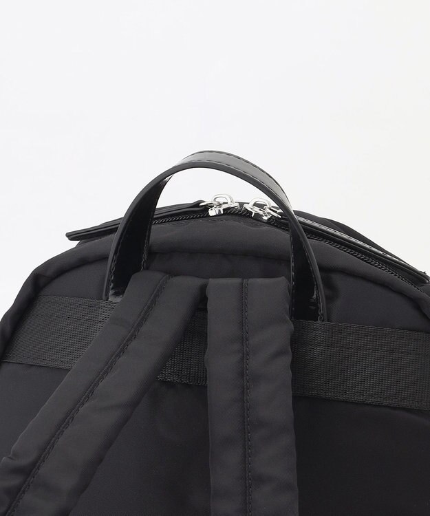 LA BAGAGERIE エナメルアクセントリュックサック ブラック
