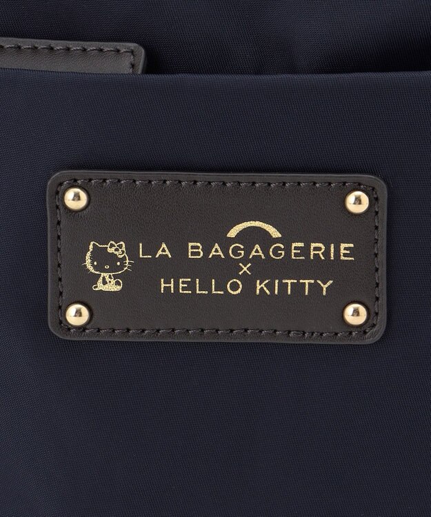 LA BAGAGERIE 【LA BAGAGERIE×HELLO KITTY】リボンチャーム付き　スクエアポシェット ネイビー