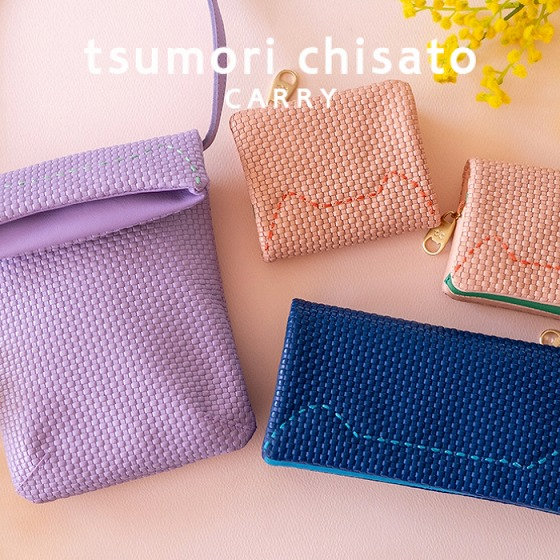 手揉み仕上げの革に、猫の手刺しステッチ