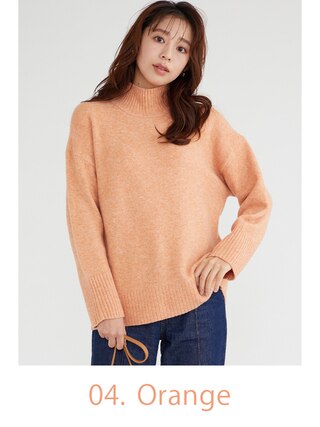 オレンジのハイネックニット プルオーバー