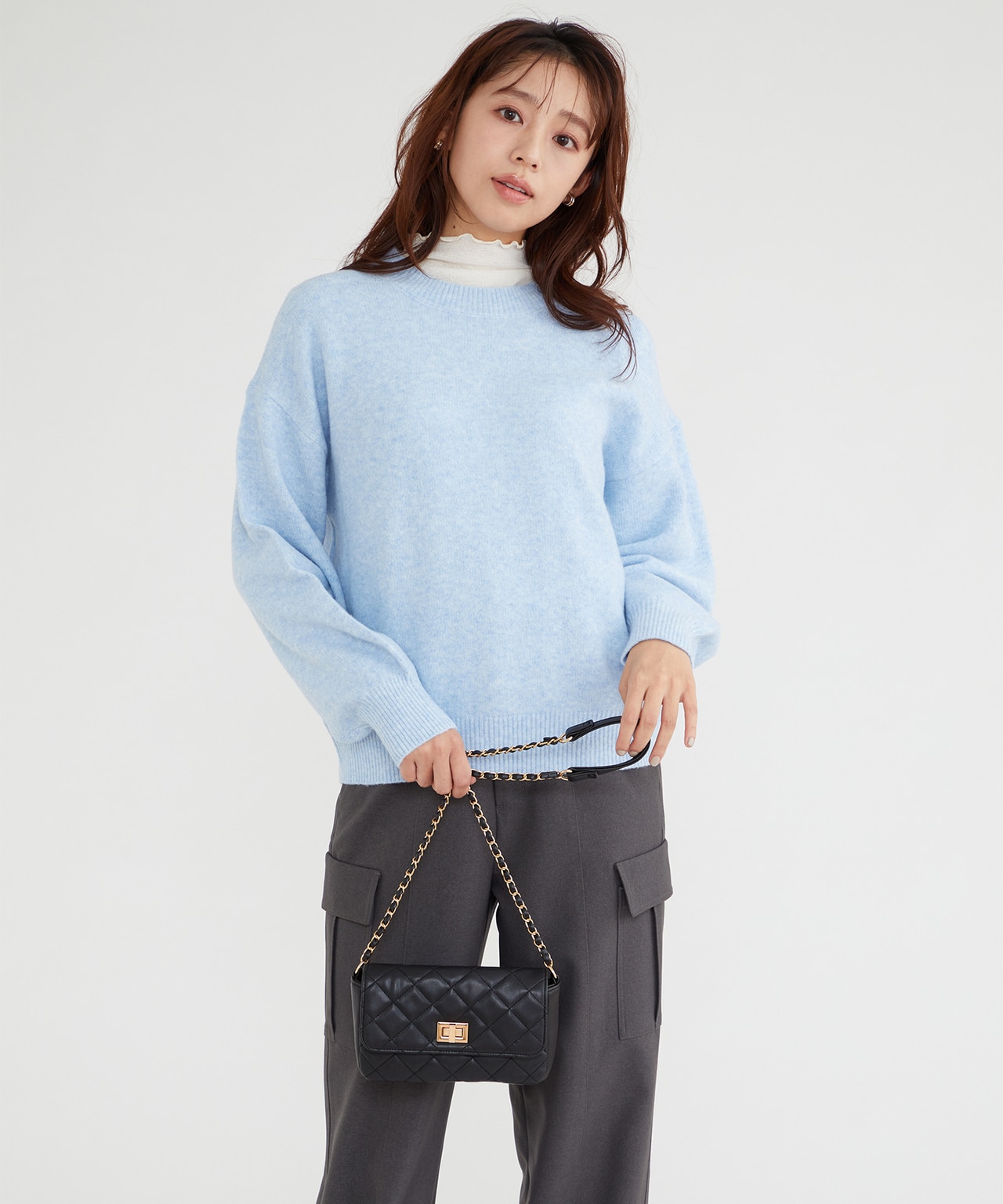 ブルーのクルーネックニット プルオーバー