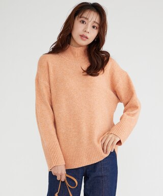 オレンジのハイネックニット プルオーバー