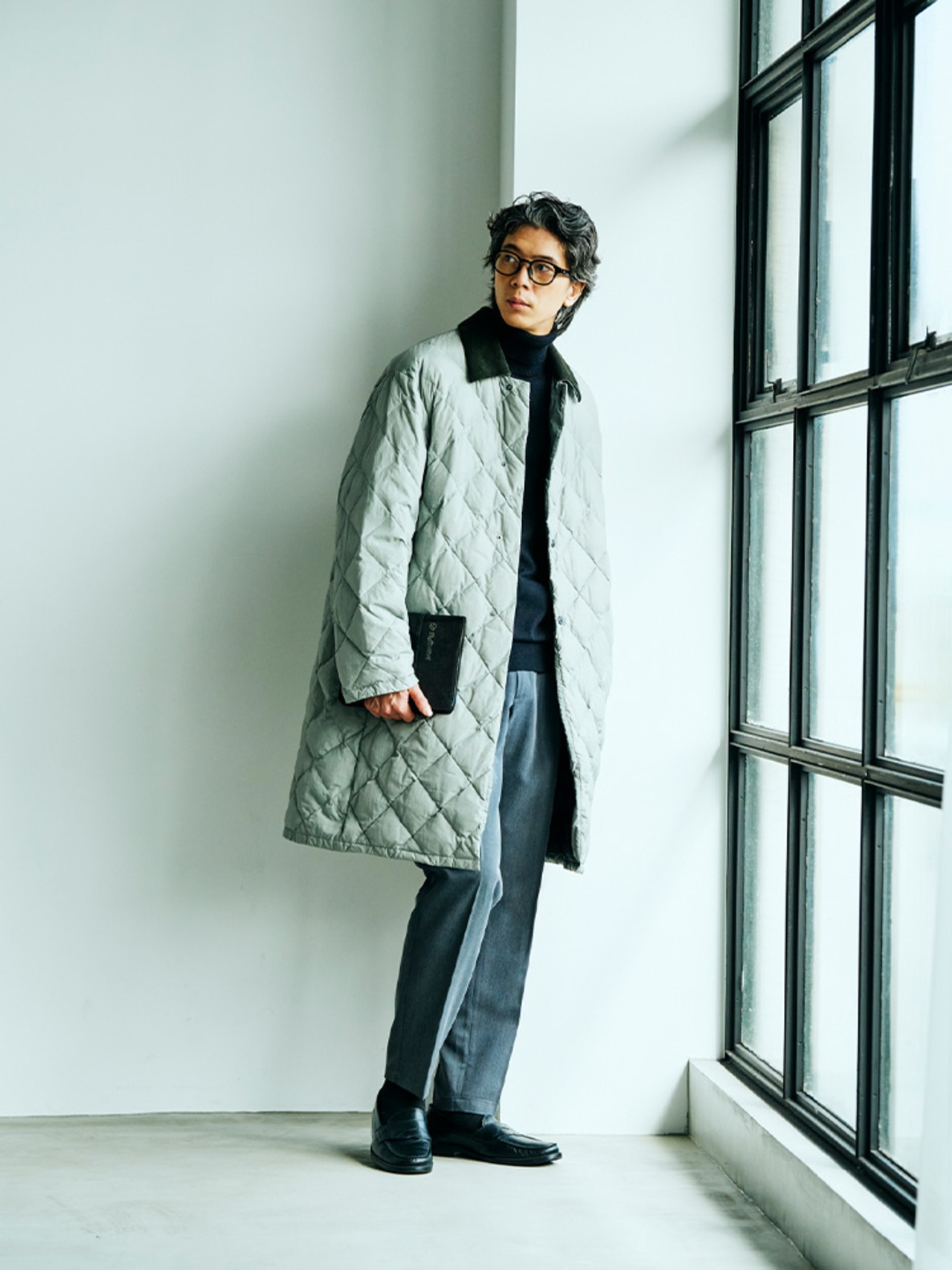 ビジネスのキルティングコートの着こなし